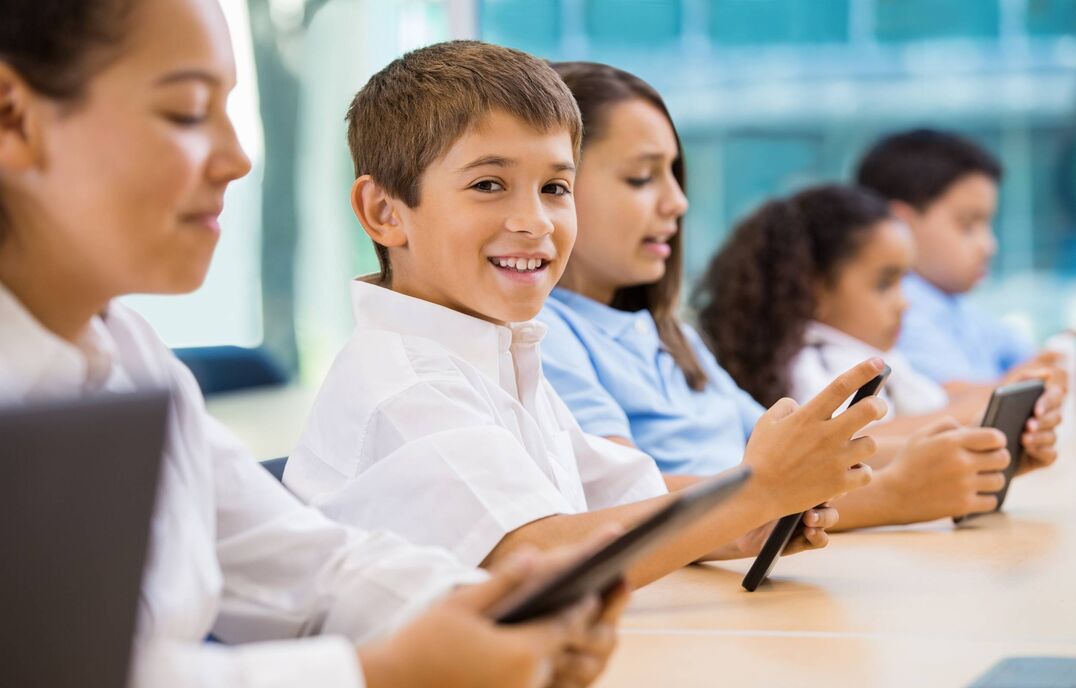 Students on tablets in classroom